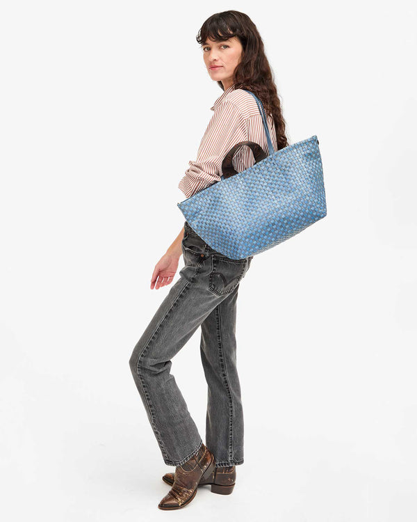 Danica wears the Bateau Tote as a shoulder bag