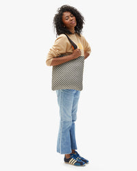 Carryall Tote on Mecca's shoulder