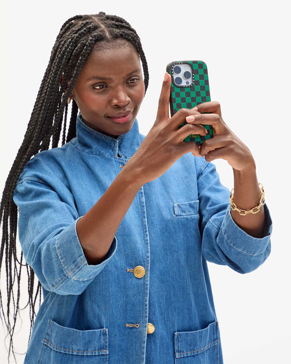 Casetify Black & Green Checker Noma taking selfie