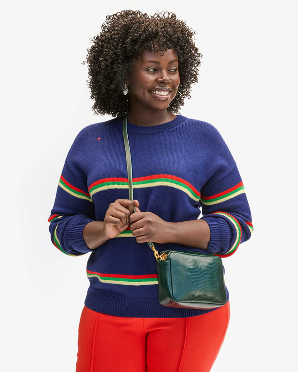 Akesha wearing Midi Sac Lizard as crossbody