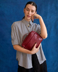 Model holding Mirabel Handbag