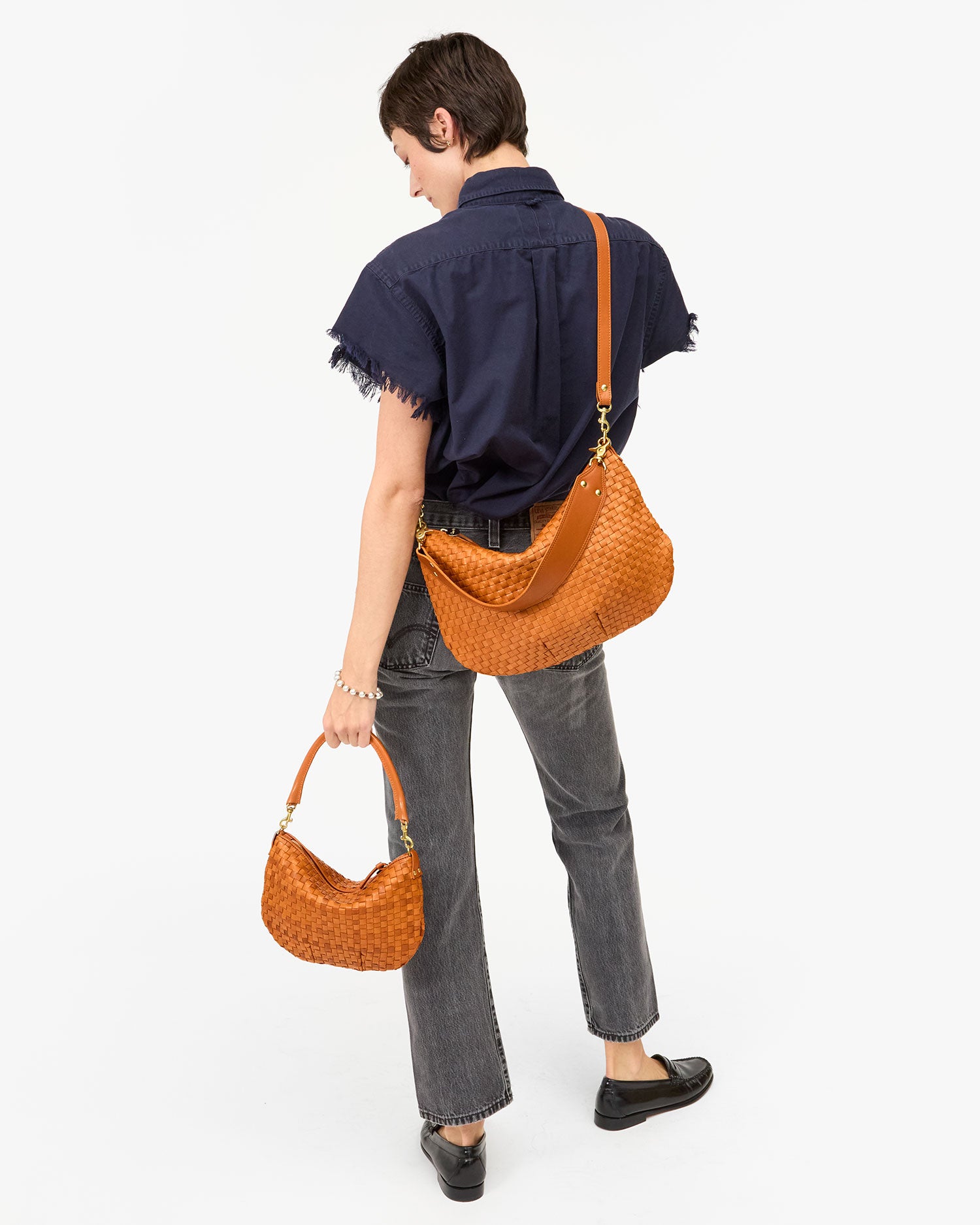 Nike wears Moyen Messenger with Petit Moyen Messenger