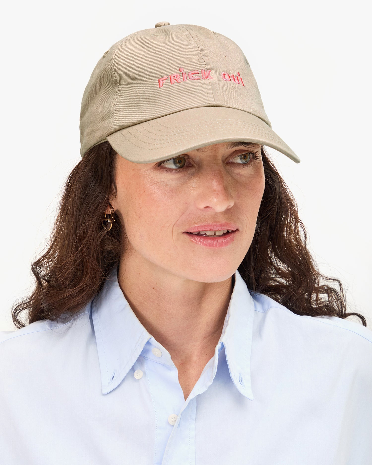 Danica wears the Baseball Hat in Khaki with Embroidered Frick Oui