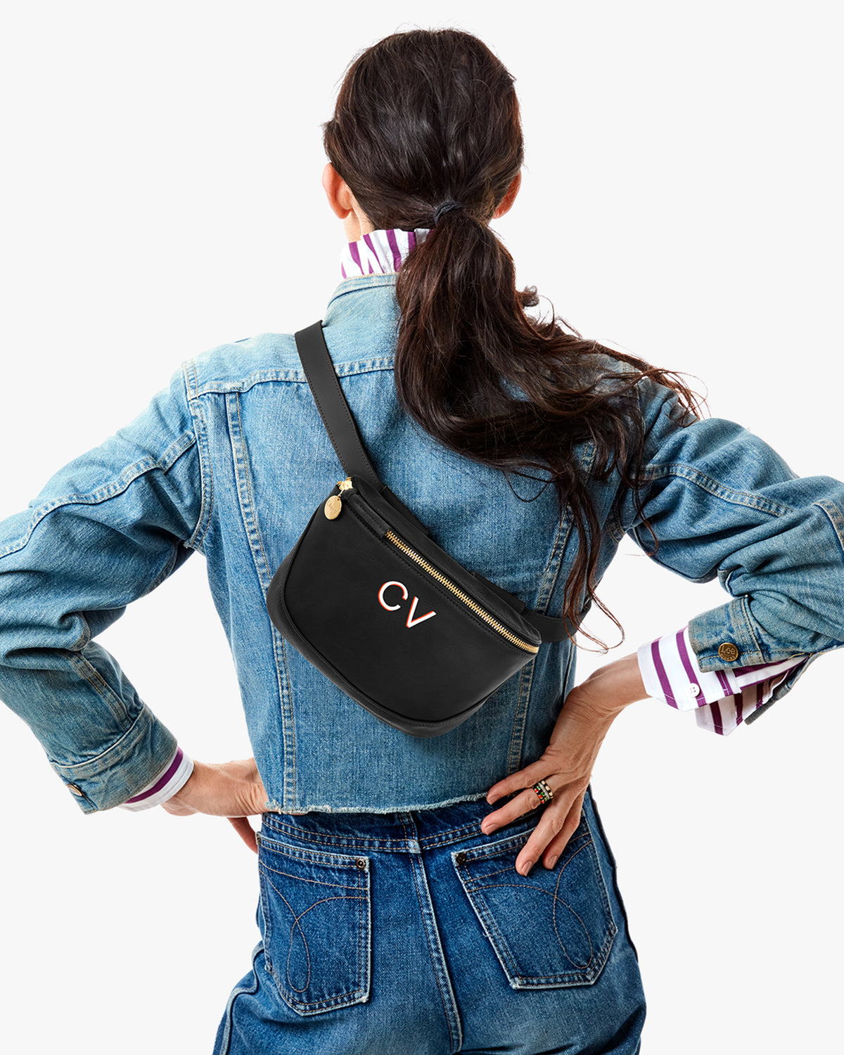 Model wearing a Hand Painted Black Fanny Pack.