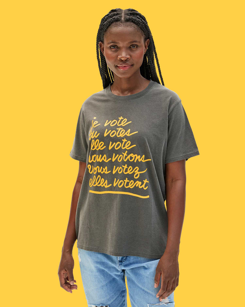 Model wearing the When We All Vote Original Tee.