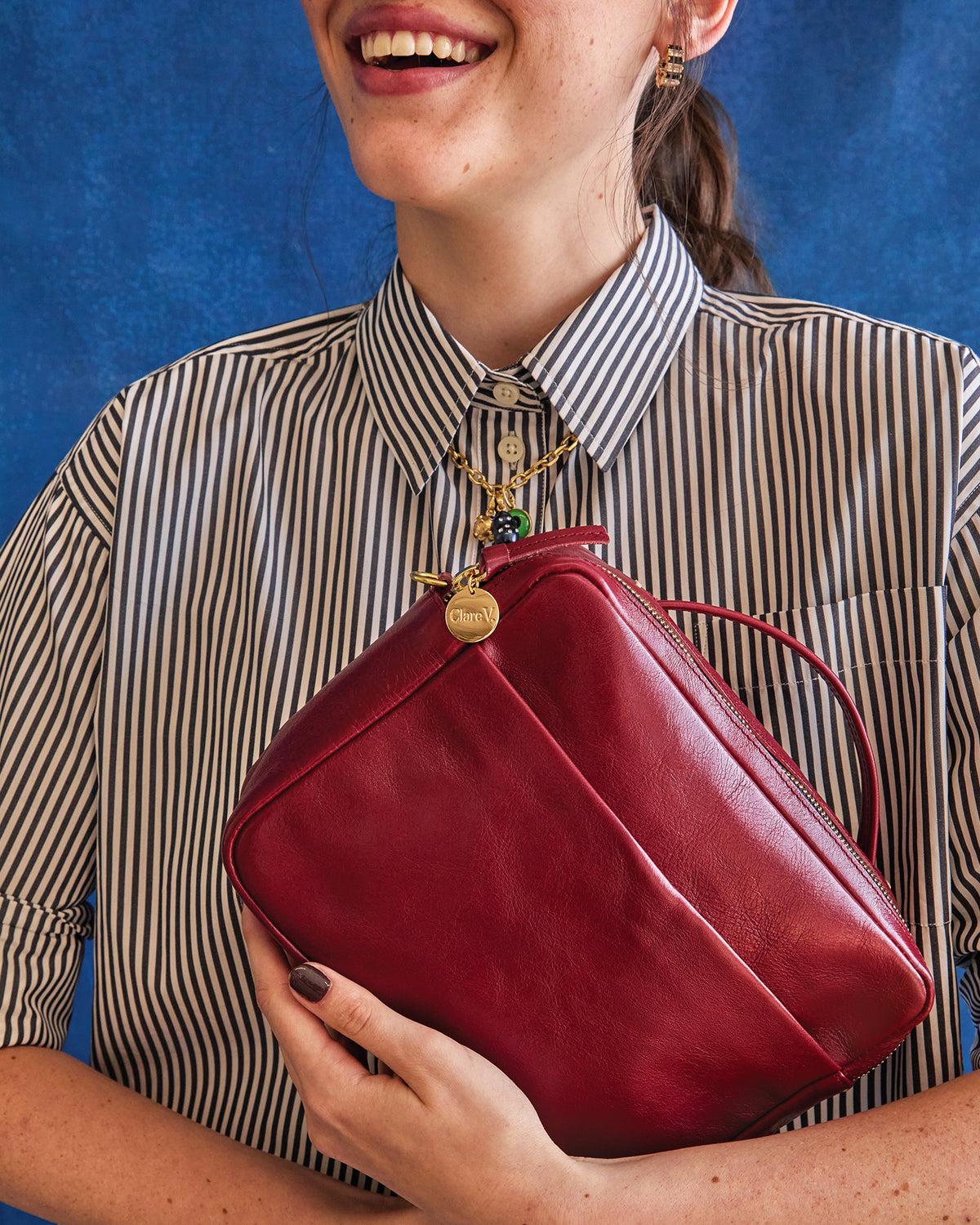 Model carrying Mirabel in Oxblood Rustic. 