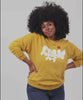 Candace wearing the Mustard Paris Los Angeles Sweatshirt and Posing and Dancing.