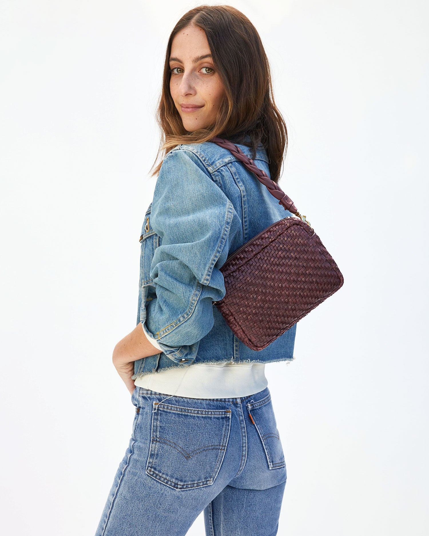 Frannie Carrying the Plum Woven Zig Zag Midi Sac ON her Shoulder with the Plum Braided Shoulder Strap